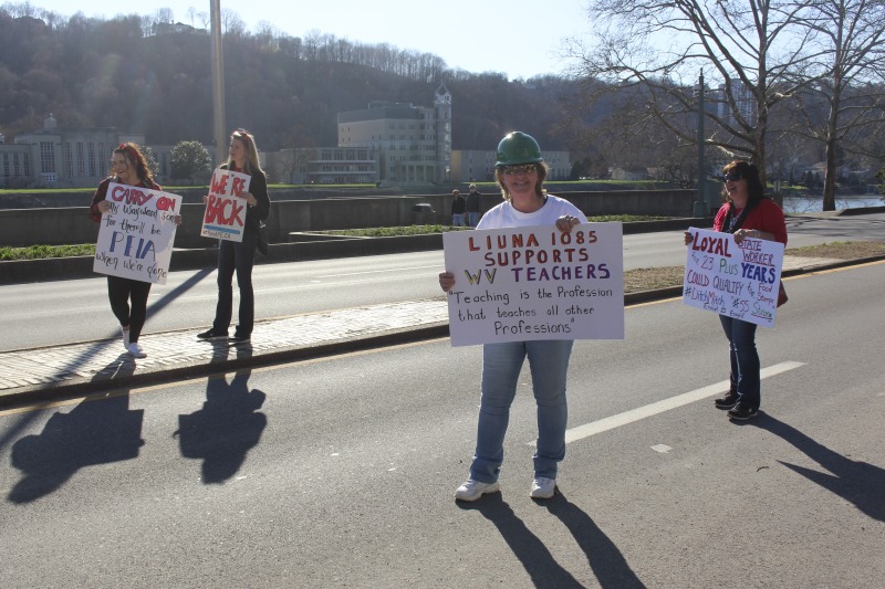 ["On February 22, 2018, thousands of West Virginia public school teachers and school service employees walked out of their classrooms in what would become a nine-day statewide strike. Teachers demands included a 5% raise and affordable healthcare coverage through the West Virginia Public Employees Insurance Agency or PEIA. These photos are part of a series of photos, videos, and interviews documenting the labor lore and expressive culture of the 2018 and 2019 West Virginia Teachers Strike.For more information on the 2018 and 2019 West Virginia Teachers Strike visit e-WV: https://www.wvencyclopedia.org/articles/2454"]%