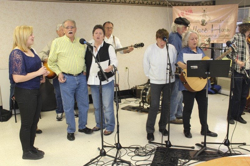 The Wallace Horn Friendly Neighbors Show is a live radio program, recorded in Logan County, and airing for over 50 years on WVOW, The Voice of the Coalfields. Wallace Horn founded the show and passed the creative directorship on to Elaine Purkey. This taping of the Friendly Neighbors Show, on November 18, 2017, was recorded at the Chapmanville Towers in Chapmanville, WV. Other taping locations include the Hot Cup coffee shop in Logan. Shows are taped twice a month.