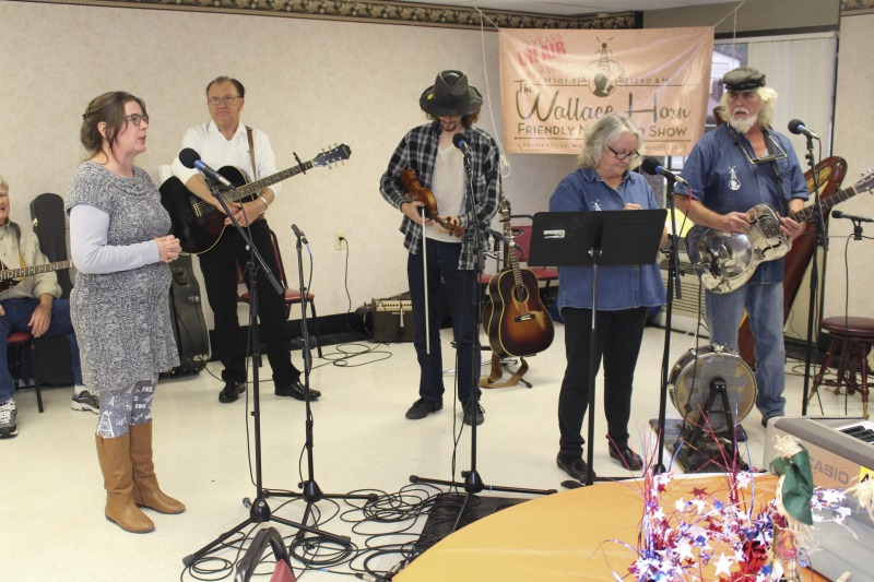 The Wallace Horn Friendly Neighbors Show is a live radio program, recorded in Logan County, and airing for over 50 years on WVOW, The Voice of the Coalfields. Wallace Horn founded the show and passed the creative directorship on to Elaine Purkey. This taping of the Friendly Neighbors Show, on November 18, 2017, was recorded at the Chapmanville Towers in Chapmanville, WV. Other taping locations include the Hot Cup coffee shop in Logan. Shows are taped twice a month.