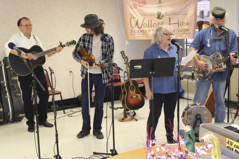 The Wallace Horn Friendly Neighbors Show is a live radio program, recorded in Logan County, and airing for over 50 years on WVOW, The Voice of the Coalfields. Wallace Horn founded the show and passed the creative directorship on to Elaine Purkey. This taping of the Friendly Neighbors Show, on November 18, 2017, was recorded at the Chapmanville Towers in Chapmanville, WV. Other taping locations include the Hot Cup coffee shop in Logan. Shows are taped twice a month.