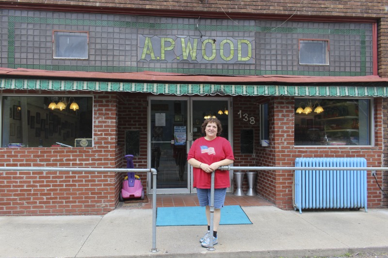 ["Yasou Restaurant is a Greek restaurant and grocery in Kimball in McDowell County. The restaurant has been owned and operated since 2003 by Markella Gianato whose maternal grandfather John Genadopoulus and father Adamantios Tommy Balasis opened The West Virginia Grocery in the same location in 1947. Genadopolous bought the building from A.P. Wood, whose name still remains on the storefront. The Grocery shut down in 2001 after the July flood all but destroyed the building.Today the restaurant serves as a hub in the Kimball community. Menu offerings include gyros, Greek-style spaghetti and meatballs, spanakopita, Greek salad, pastitsio (a Greek pasta with meat and bchamel), dolmades (stuffed grape leaves), and saganaki (pan-seared Greek cheese).State folklorist Emily Hilliard interviewed Gianato about her family history, foodways, and the business on April 27, 2016, but the interview was lost when Folklife Program equipment was stolen. Gianatos Our History statement on the Yasou website:On February 7, 1947, the Greek-American families of John Genadopoulos and Adamantios Tommy Balasis and Mary Balasis purchased the A.P. Wood Grocery.  Though the store was renamed the West Virginia Grocery, the name A.P. Wood remains etched in beautiful stained glass over the door at present day YaSou. From that time until the devasting flood of July 2001, the family kept the grocery in operation.  Ten months later, a second major flood hit the town within days of the business being reopened.  Despite this major setback, we were determined to move forward and reopen the business. Having my own restaurant was a lifelong dream, and on February 7, 2003, with the help of my mother Mary Balasis, my brothers John and Mathew, my husband Jimmy Joe, my son Adam, my mother-in-law Mary Verduce Gianato and the Grace of God, that dream became a reality with the opening of YaSou Restaurant.   I am immensely proud of the success that I have achieved.  I offer home-cooked meals, daily specials, and Greek cuisine along with many sandwich choices.  Most of the recipes I have used have been handed down to me from my mother and grandmother.  My love for the restaurant business came from my first job at the Virginian Restaurant in Pearisburg, Virginia, working under the guiding hands of, in my opinion, two of the greatest chefs, uncles and mentors, Mike and George Genadopoulos.  It was my days at the Virginian that made me realize I would someday like to become a great chef.  I strive for this every day. This has allowed me to meet many wonderful people who have stopped in along the way, as well as many local regulars who come in and make my day complete.  We hope to serve you for many years to come. Everyone that comes here, even for one time, becomes a part of the labyrinth of my life and will always be part of the memories here.  I want my guests to feel at home and comfortable when that are here.  If you have any concerns or requests, please feel free to ask.                                                             ---MarkellaRead more on the Yasou website: https://yasourestaurant-restaurant.business.site/"]%