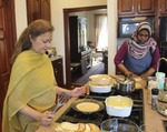 ["Ruby Abdulla, b. 1949, is an immigrant from southern India (via Canada). She was born in Madurai. Abdulla is Muslim and a member of Indias Memon community, a cultural minority. She is active with the Islamic Center in Charleston and is a skilled home cook, preparing traditional southern and northern Indian dishes. Nariman Farah is a Charleston resident from Sudan. She is Mulsim and a member of the Islamic Center in Charleston."]