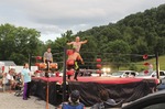 ["All Star Wrestling (ASW) is an independent wrestling promotion out of Madison, West Virginia, owned and operated by Gary Damron. Wrestlers on ASWs regular card include Rocky Rage (Rocky Hardin), Huffmanly (Kasey Huffman), and Shane Storm. On July 18, 2020, during the COVID-19 pandemic, Damron held ASWs first Drive-In Wrestling event at Lees Dance Studio in Winfield, WV. Fans circled the ring with their cars and sat in and on their cars and in bleachers to watch the matches."]
