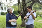 ["Kim Johnson and Cody Jordan were participants in the 2020-2021 West Virginia Folklife Apprenticeship Program. Kim Johnson, a resident of South Charleston led an apprenticeship in banjo traditions of central West Virginia with apprentice Cody Jordan of Charleston. Johnson began playing with fiddler Wilson Douglas in 1979 and has played with and learned from many acclaimed West Virginia old-time musicians including Frank George and Lester McCumbers. She has taught both locally and nationally, at Augusta Heritage Center, Allegheny Echoes, The Festival of American Fiddle Tunes, and the Berkeley Old-time Music Convention. Jordan plays guitar in The Modock Rounders with Johnson, touring across the state and region, and is looking forward to expanding his knowledge of central West Virginia old-time banjo traditions.See our feature on Johnsons apprenticeship with Jordan here: https://wvfolklife.org/2020/09/04/2020-folklife-apprenticeship-feature-kim-johnson-cody-jordan-banjo-traditions-of-central-west-virginia/The West Virginia Folklife Apprenticeship Program offers up to a $3,000 stipend to West Virginia master traditional artists or tradition bearers working with qualified apprentices on a year-long in-depth apprenticeship in their cultural expression or traditional art form. These apprenticeships aim to facilitate the transmission of techniques and artistry of the forms, as well as their histories and traditions.The apprenticeship program grants are administered by the West Virginia Folklife Program at the West Virginia Humanities Council in Charleston and are supported in part by an Art Works grant from the National Endowment for the Arts. West Virginia Folklife is dedicated to the documentation, preservation, presentation, and support of West Virginias vibrant cultural heritage and living traditions."]