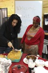 ["On February 25, 2020, Amy Loughs (b. 1975, Murray, Kentucky) Hardy County ESOL class in Moorefield hosted an Ethiopian/Eritrean coffee ceremony and potluck. Students, who are of Haitian, Burmese, Eritrean, Ethiopian, and Puerto Rican dissent brought in food dishes from their respective cultural traditions, to share with the class and state folklorist Emily Hilliard. The majority of the ESOL students work at Pilgrims Pride chicken plant in Moorefield. Dishes students brought to class include Mohinga, a Burmese soup with chili; a Burmese tea leaf salad; and Yuzana, a Burmese pickled tea; Ethiopian Doro Wat; Puerto Rican bread pudding; Haitian fried pork with gratin; and Himbasha, an Ethiopian bread with black sesame seeds or black cumin."]