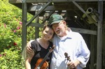 ["John D. Morris of Ivydale led an apprenticeship in old-time fiddle and stories of Clay County with Jen Iskow of Thomas as part of the 2018 West Virginia Folklife Apprenticeship Program, supported in part by the National Endowment for the Arts. John D. MorrisBorn in Ivydale, Clay County, into a family steeped in traditional music, David and John Morris learned from family and neighbors, including banjo player Jenes Cottrell and fiddler French Carpenter. After David returned from Vietnam in 1968, the brothers began organizing musical get-togethers and, in 1969, held the first Morris Family Old-Time Music Festival that same year. The festival became a major traditional music event in Clay County and filmmaker Bob Gates documented the 1972 festival in his film The Morris Family Old-Time Music Festival.Members of The Morris Brothers band included Pocahontas County old-time banjo player Dwight Diller and the late North Carolina harmonica player John Martin. Playing a mix of old-time, bluegrass, and country styles, including some of Davids original music, the group played together through the mid-70s, releasing an LP in the late 60s, Music As We Learned It, and two live shows on eight-track tapes. John, a traditional fiddler, and David, a singer, songwriter, and guitarist, were involved in union and environmental activities from the late 1960s through the 1970s. They were also instrumental in establishing the first Vandalia Gathering at the Cultural Center in 1977.The Morris Brothers music was featured in Barbara Kopples 1976 film Harlan County, USA. David, who passed away in 2016, contributed music to Kopples 2015 film about Vietnam vets, Shelter.John lives in Ivydale and plays fiddle at music events across West Virginia. He is a rich source of information about the history of old-time music in central West Virginia, and one of the few native fiddlers of his generation to continue the older style of playing.Morris was awarded the National Endowment for the Arts National Heritage Fellowship, the nations highest honor in the folk and traditional arts, in 2020.Jen IskowJen Iskow is an artist, designer, musician, and community organizer based in Thomas, West Virginia. Born and raised in Rockville, Maryland, Jen grew up learning to play blues and punk music. It wasnt until she moved to Morgantown in 2009 for college that she was introduced to old-time music at the weekly Brew Pub jam hosted by Stewed Mulligan. After graduating from West Virginia University, she finally settled in Elkins, West Virginia and accepted a position as the Marketing Coordinator for the Augusta Heritage Center. Suddenly being surrounded by so many talented traditional artists, Jen was immersed into the music and inspired to learn to play fiddle. After studying under talented fiddlers such as Scott Prouty, Erynn Marshall, Jesse Wells, Ben Townsend, John Harrod, and more, Jen met John Morris at his house in Ivydale, and the rest is historySee our feature on Morris apprenticeship with Iskow here: https://wvfolklife.org/2018/11/09/2018-master-artist-apprentice-feature-john-morris-jen-iskow-old-time-fiddling-and-stories-of-clay-county/"]