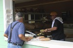 ["Every summer Wednesday since 1969, members of the Serbian Eastern Orthodox Church Mens Club have hosted a Chicken Blast at the Serbian Picnic Grounds along Kings Creek outside of Weirton, West Virginia. They roast 300-400 chickens per week as a fundraiser for the maintenance of the picnic grounds. The spits, an industrial brick oven, and walk-in coolers were constructed in the 1960s out of material from Weirton Steel by Mens Club members, most of whom were Weirton Steel employees. Each week, the choir also sells pogacha (a type of Serbian bread), haluski or cabbage and noodles, corn on the cob, strudel and other desserts. The bar at the picnic grounds is also open, serving beer and Slivovitz.See the short video and audio documentary about the Chicken Blasts, produced by the West Virginia Folklife Program and West Virginia Public Broadcasting: https://wvfolklife.org/2020/01/27/weirtons-serbian-heritage-is-a-chicken-blast/ https://www.youtube.com/watch?v=XpGF-MFUlhYhttps://soundcloud.com/wvpublicnews/weirtons-serbian-heritage-is-a-chicken-blast"]