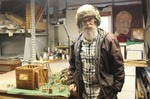 ["Benjamin (Benny) D. Snyder, 60, is a miniatures maker, woodcarver, and poultry farmer living at The Folly farm outside of Shepherdstown, WV. He makes miniatures on a 1/12th dollhouse scale of objects in his environment such as wheelbarrows, tools, scaffolding, tool sheds, park benches, watering cans, and more. He is a native of Weirton, WV and a U.S. Army veteran."]