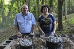 ["On September 21, 2017, old-time musician and writer Pete Koskys Appalachian Studies class at South Charleston High School made biscuits in a cast iron Dutch oven over a charcoal fire at the ROTC picnic shelter on the school campus. Kosky invited state folklorist Emily Hilliard to the class."]
