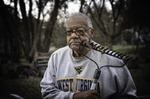 ["Thomas Toliver, 87, at the time of the interview, is an urban gardener of the West Side of Charleston. He works in prisons as a mentor, and has taken in children of incarcerated people through his organization Family Youth in Development Service, Men and Children of Prisoners. In his urban garden, he is particularly interested in working with unhoused people. Toliver grew up working on a plantation-like estate in the Charleston neighborhood of South Hills, where his father was a gardener and chauffeur and his mother was a maid. Toliver was interviewed by producer Aaron Henkin with Emily Hilliard as part of the Out of the Blocks podcasts two episodes on Charlestons West Side. Learn more: https://wvfolklife.org/2020/01/17/out-of-the-blocks-podcast-highlights-charlestons-west-side-west-virginia-folklife-hosts-listening-party-february-12/"]
