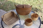 ["Aaron (Ike) Yakim (b. 1949, Charleroi, PA) and Cynthia W. Taylor (b. 1950, Virginia) are traditional white oak basket makers living in Parkersburg, West Virginia. Yakim learned the art form in the late 70s from 5th generation West Virginia basket maker, Oral \"Nick\" Nicholson of Doddridge County. Yakim and Taylor, who work from live tree-to-basket, are not regularly making baskets currently due to the intense labor required as well as the scarcity of suitable white oak trees. Yakim has produced over 2,500 baskets, several of which are included in the Smithsonian Museum of American Arts collection. Learn more via the Smithsonian Museum of American Art: https://americanart.si.edu/artist/aaron-yakim-27916And via Cedar Creek Gallery: http://cedarcreekgallery.com/album/yakim_taylor.html"]